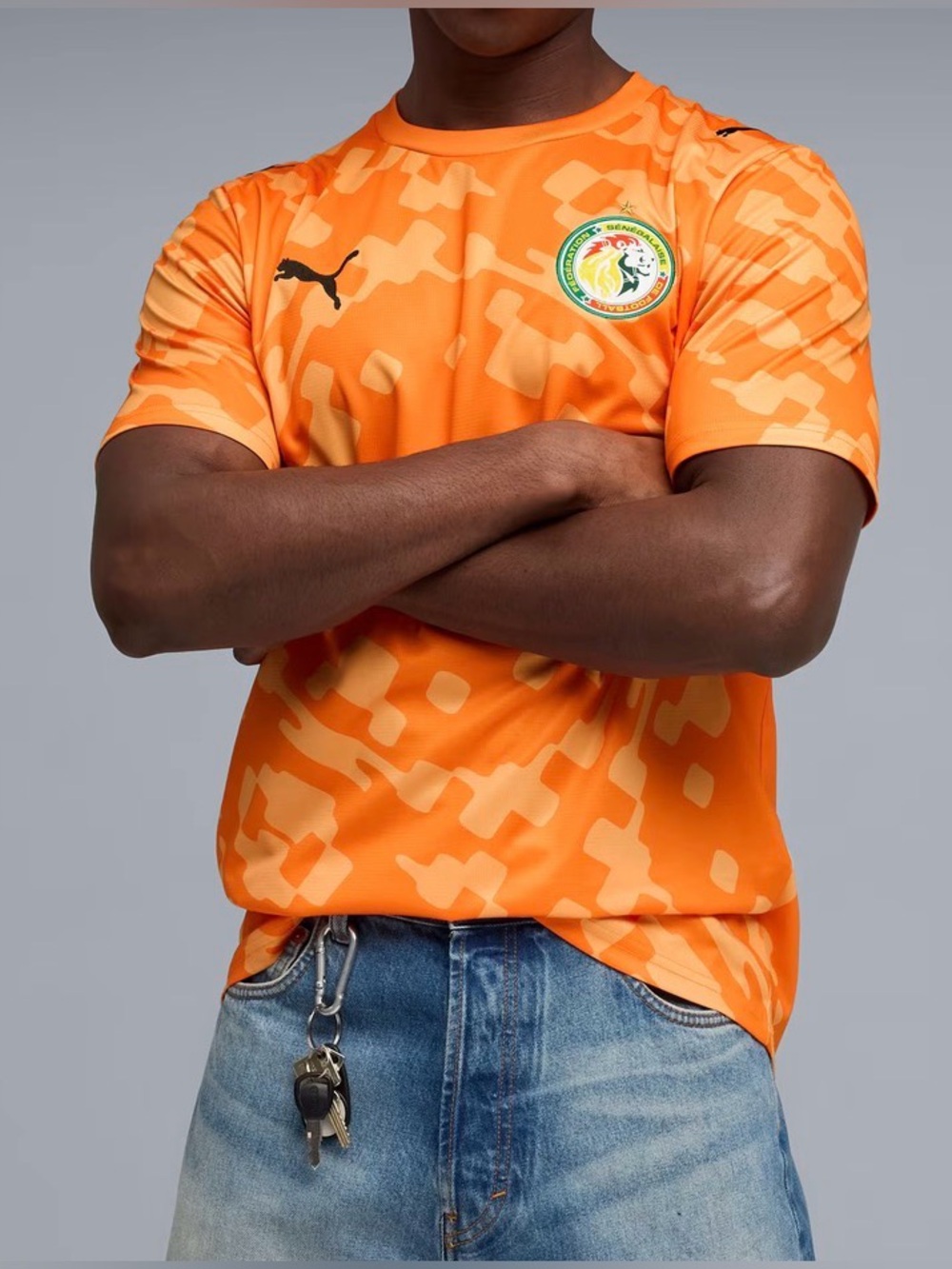 PUMA x SENEGAL x SALEHE BEMBURY
Orange Camo Senegal Football Jersey